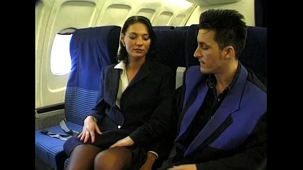 HD Brunette beauty wearing stewardess uniform gets fucked on a plane mega klipy