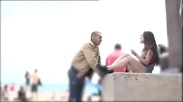 HD He proves he can pick any girl at the Barcelona beach mega Clips